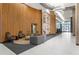 Elegant lobby with wood paneling, modern lighting, comfortable seating, and marble floors at 943 Peachtree Ne St # 1003, Atlanta, GA 30309