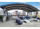 Stylish outdoor terrace with comfortable seating, dining tables, grills, and city views at 943 Peachtree Ne St # 1003, Atlanta, GA 30309