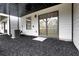 Backyard with dark mulch, patio area, window, sliding glass door, and white siding at , Lawrenceville, GA 30046