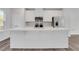 Bright kitchen features a large white island, stainless steel appliances, and plenty of counter space at , Lawrenceville, GA 30046