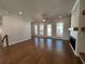 Large living room with hardwood floors, recessed lighting, and a fireplace at 122 Stonehouse Dr, Cumming, GA 30040
