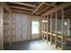 Spacious interior framing with insulation showcasing design and potential at 2055 Ripple Park Bend, Canton, GA 30114