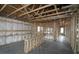 Interior of new home with unfinished walls showcasing framing and insulation at 2055 Ripple Park Bend, Canton, GA 30114