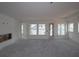 A spacious living room with many windows at 2055 Ripple Park Bnd, Canton, GA 30114