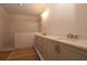 Elegant bathroom featuring dual vanities, and a spacious walk-in shower at 2055 Ripple Park Bnd, Canton, GA 30114