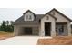 Charming single-Gathering home with a two-car garage and a modern design, ready for new owners at 2055 Ripple Park Bnd, Canton, GA 30114