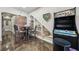 Finished basement offering an entertainment area with a bar, gaming machine, and comfortable seating at 3149 Hidden Falls Ne Dr, Buford, GA 30519