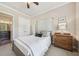 Bedroom with closet, ensuite bathroom, natural light, and neutral tones at 3149 Hidden Falls Ne Dr, Buford, GA 30519