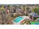 Aerial view of a community pool with a play area and clubhouse at 3149 Hidden Falls Ne Dr, Buford, GA 30519