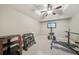 Home gym equipped with weights, a weight bench, and a wall-mounted television for workout entertainment at 3149 Hidden Falls Ne Dr, Buford, GA 30519