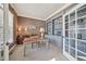 Home office with built-in bookshelves, a large window, and a neutral color scheme for a professional setting at 3149 Hidden Falls Ne Dr, Buford, GA 30519