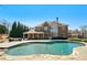 A large brick house is pictured with a beautiful yard featuring a swimming pool and stone patio at 3149 Hidden Falls Ne Dr, Buford, GA 30519