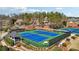 Community tennis courts and playground offering recreational activities for residents and guests at 3149 Hidden Falls Ne Dr, Buford, GA 30519