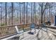 Exterior deck with outdoor seating, grill, and views of the yard at 2970 Oxford Rd, Atlanta, GA 30349