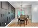 Comfortable dining room area with framed decorations on a black accent wall at 2970 Oxford Rd, Atlanta, GA 30349