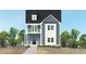 Charming two-story home featuring a covered porch, second story balcony, and classic architectural details at 3131 Stonegate Sw Dr, Atlanta, GA 30331