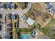 Overhead shot of community amenities with tennis courts, pool, and clubhouse at 2121 Hempstead Ct, Snellville, GA 30078