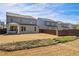 The property showcases a spacious back yard and rear exterior with patio, ideal for outdoor enjoyment and entertainment at 2121 Hempstead Ct, Snellville, GA 30078