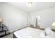 Neutral bedroom with carpet and a view into the ensuite bathroom at 2121 Hempstead Ct, Snellville, GA 30078