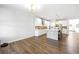 Open-concept living area with hardwood floors and great natural light at 2121 Hempstead Ct, Snellville, GA 30078