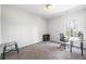 Bright office space features a window, work desk and chair perfect for work or studying from home at 2121 Hempstead Ct, Snellville, GA 30078