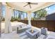 Relaxing outdoor patio featuring comfortable seating, a fire pit, and string lights at 2121 Hempstead Ct, Snellville, GA 30078