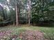 View of the wooded area behind the house at 3013 Rockview Dr, Loganville, GA 30052