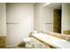 Bathroom featuring dual sinks and granite countertops at 3013 Rockview Dr, Loganville, GA 30052