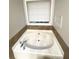 Clean bathtub with tiled backsplash and window, perfect for a relaxing soak after a long day at 3013 Rockview Dr, Loganville, GA 30052