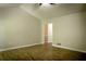 Bedroom with vaulted ceiling, wood floors, and ensuite bathroom at 3013 Rockview Dr, Loganville, GA 30052