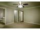 Bedroom featuring neutral colors, crown molding, ensuite bath and walk-in closets at 3013 Rockview Dr, Loganville, GA 30052