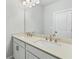 Bathroom with double vanity, quartz countertop, and neutral paint at 630 Silva St, Cumming, GA 30040
