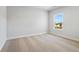 Bedroom features carpet and neutral paint with view of the outdoors at 630 Silva St, Cumming, GA 30040