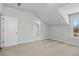 Bedroom with neutral carpet, white walls, baseboards and trim and door leading to closet at 630 Silva St, Cumming, GA 30040