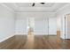 Large main bedroom with hardwood floors and access to bathroom at 630 Silva St, Cumming, GA 30040