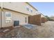 Townhome backyard featuring a patio, and AC unit with a wood fence at 1831 Broad River Rd, Atlanta, GA 30349