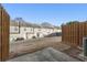 Fenced backyard view of multiple townhomes at 1831 Broad River Rd, Atlanta, GA 30349