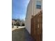 Side view of townhome with backyard fence at 1831 Broad River Rd, Atlanta, GA 30349