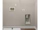 This laundry room shows hook ups for a washer and dryer and a utility sink at 1831 Broad River Rd, Atlanta, GA 30349