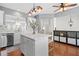 Open-concept kitchen island with seating, modern appliances, and stylish finishes, enhancing the space at 2517 Ashwicke Se Dr, Atlanta, GA 30339