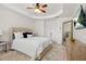 Inviting main bedroom with neutral tones, tray ceilings, and a spacious closet at 2517 Ashwicke Se Dr, Atlanta, GA 30339