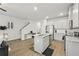 Kitchen featuring granite counters, stainless appliances, and an open design at 7005 Livia Pt, Riverdale, GA 30296