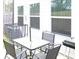 Outdoor patio set with a dining table and furniture at 7005 Livia Pt, Riverdale, GA 30296