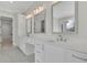 Large primary bathroom features a dual sink vanity with marble counters and modern fixtures at 123 Candler Loop, Acworth, GA 30101