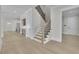 Spacious foyer with hardwood floors, staircase, and views to other rooms at 123 Candler Loop, Acworth, GA 30101
