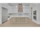 Gourmet kitchen with a large island, stainless appliances, and custom cabinets at 123 Candler Loop, Acworth, GA 30101