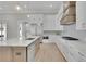 Modern kitchen featuring stainless appliances, large island, and pendant lighting at 123 Candler Loop, Acworth, GA 30101