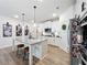 Bright kitchen with white cabinets, granite counters, and stainless-steel appliances at 142 Richmond Way, Villa Rica, GA 30180