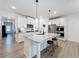 Spacious kitchen island featuring granite countertops and seating, ideal for entertaining at 142 Richmond Way, Villa Rica, GA 30180