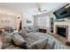 Cozy living room with comfortable seating, fireplace, and stylish decor at 142 Richmond Way, Villa Rica, GA 30180